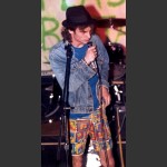 Will Wonkers, composed, in a hat and shorts